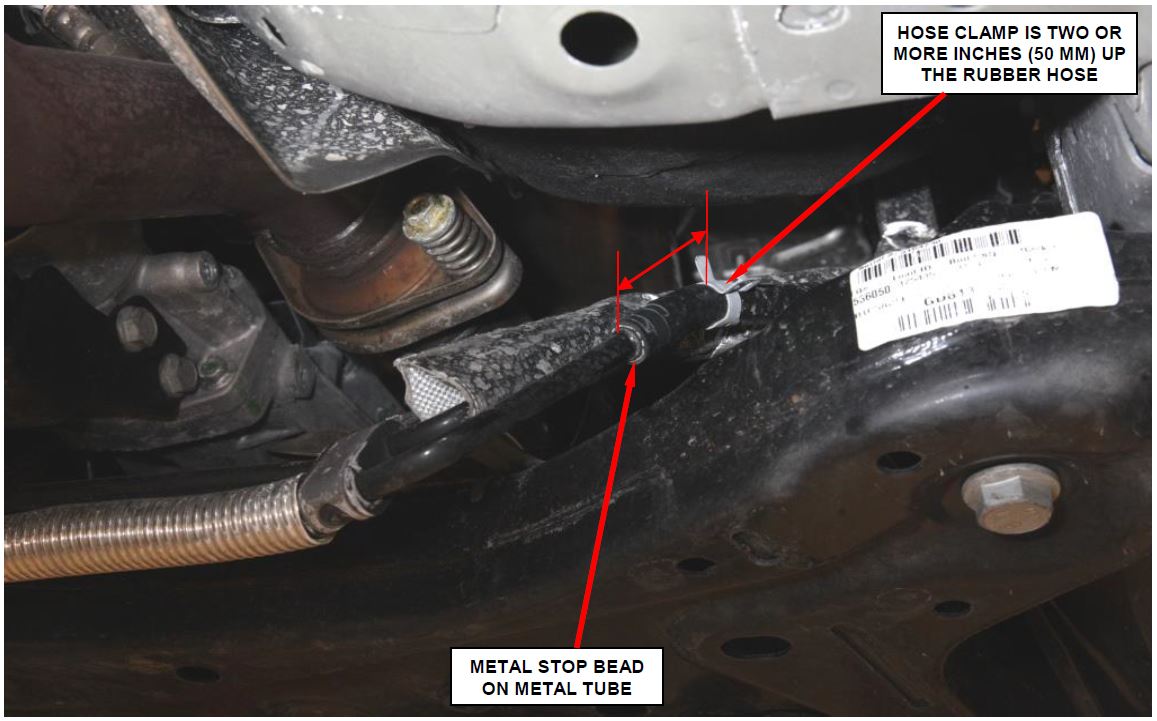 Incorrectly Located Power Steering Return Hose Clamp