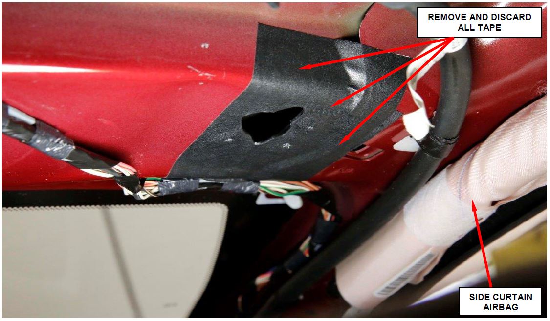Remove and Discard the Abrasion Tape and Tape Patches from Left and Right Visor Hole Openings (right side shown)